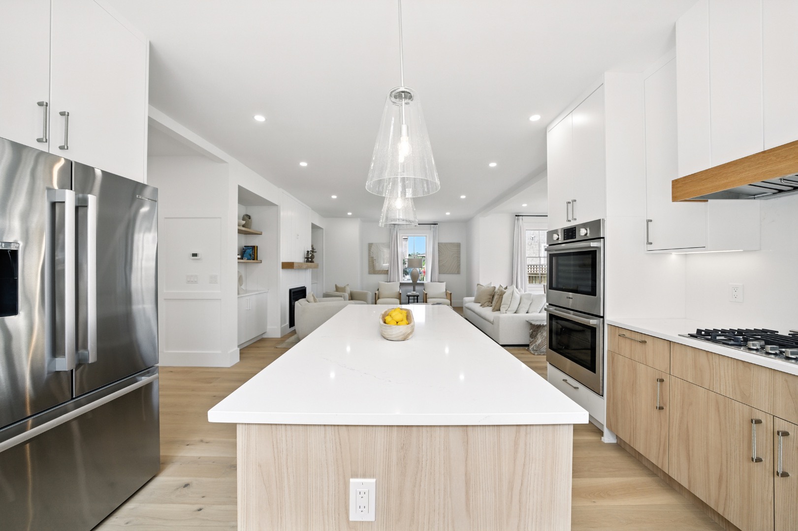 10 Beach Grass Road Nantucket, MA 02554 - Photo 6 of 29 a kitchen with stainless steel appliances a refrigerator and a stove