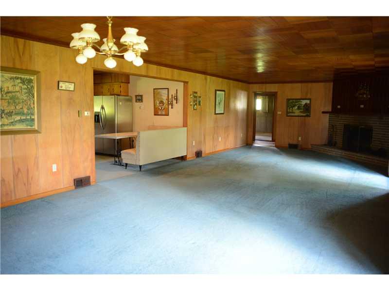 252 Rupp Church Road Kittanning, PA 16201 - Photo 7 of 18 Dining Room. Dining room & living room are all one very large space and is open to the kitchen separated by a banquet for kitchen seating.