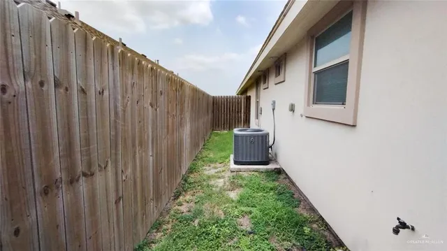a house view with a backyard space