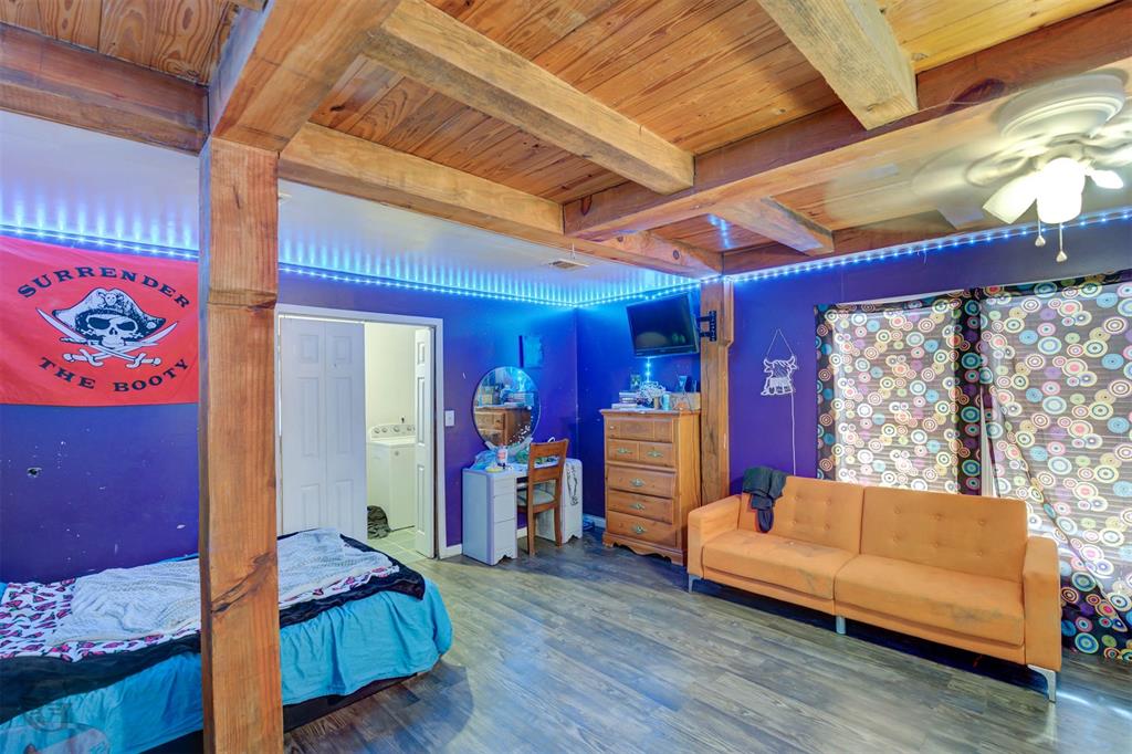 120 Bella Vista Loop Homer, LA 71040 - Photo 15 of 27 Bedroom with a wooden ceiling with exposed beams and wood finished floors