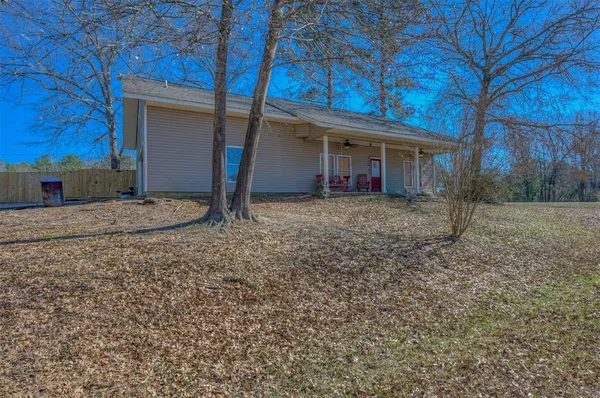 a house with yard in front of it