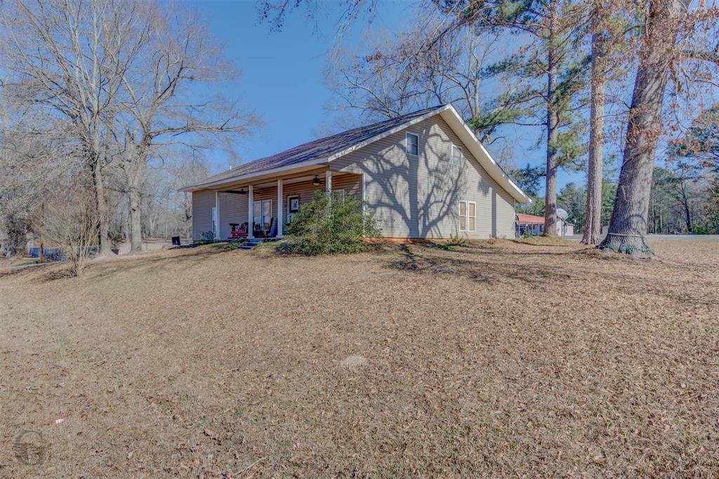 120 Bella Vista Loop Homer, LA 71040 - Photo 2 of 27 View of side of home with covered porch