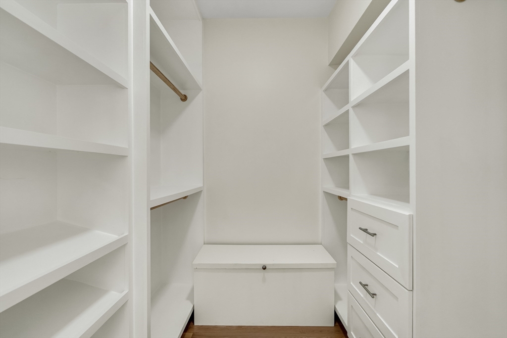 510 Common Street Walpole, MA 02081 - Photo 14 of 35 a view of an empty walk in closet