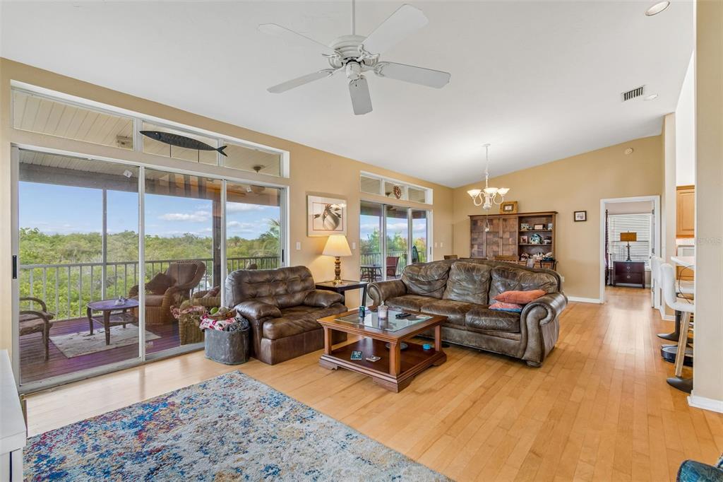119 Burns Road Terra Ceia, FL 34250 - Photo 31 of 100 a living room with furniture large window and a table