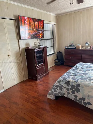 a bathroom with a shower and a toilet