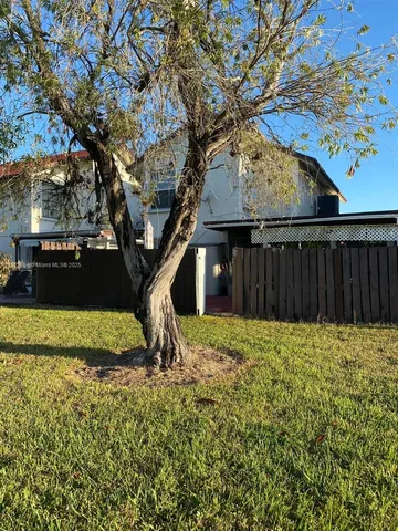 a view of a golf course with a lake