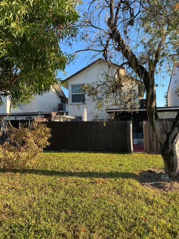 a view of a golf course with a lake