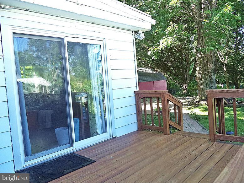 12714 Holdridge Road Silver Spring, MD 20906 - Photo 23 of 30 Family-Rm. SLIDERS to DECK and Fenced Court-Yard !