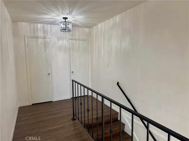 a view of entryway with wooden floor