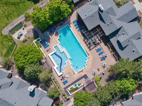 an aerial view of a house with outdoor space and street view