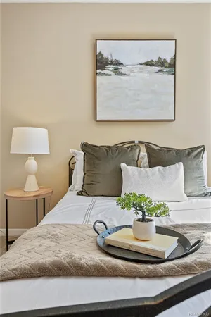 a bathroom with a bathtub and mirror