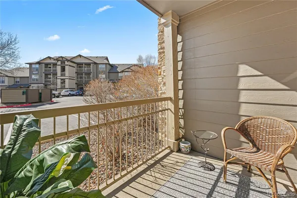 a view of balcony with a potted plant