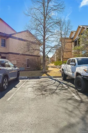 a view of a car parked in front of a house
