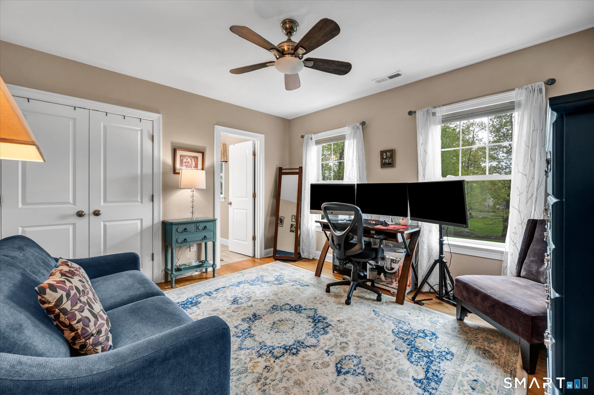 16 Sweetheart Mountain Road Canton, CT 06019 - Photo 27 of 40 a living room with furniture and a large window