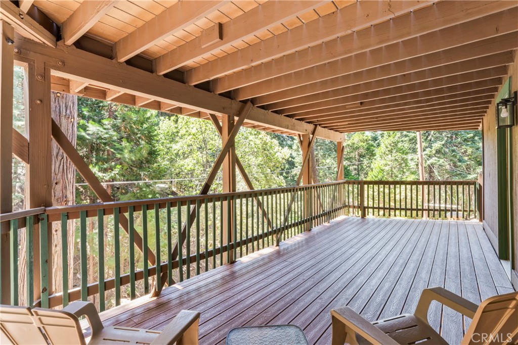 899 Blue Ridge Drive Lake Arrowhead, CA 92385 - Photo 34 of 49 a view of a porch with wooden floor