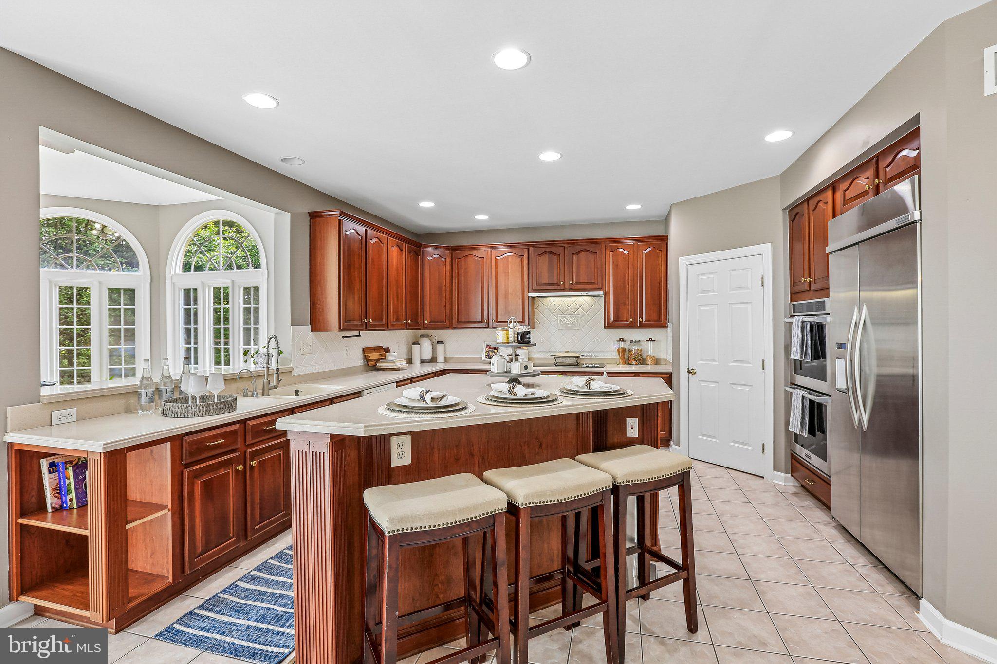 9308 Harrisons Farm Way Gaithersburg, MD 20882 - Photo 16 of 92 Love the bar stool seating.