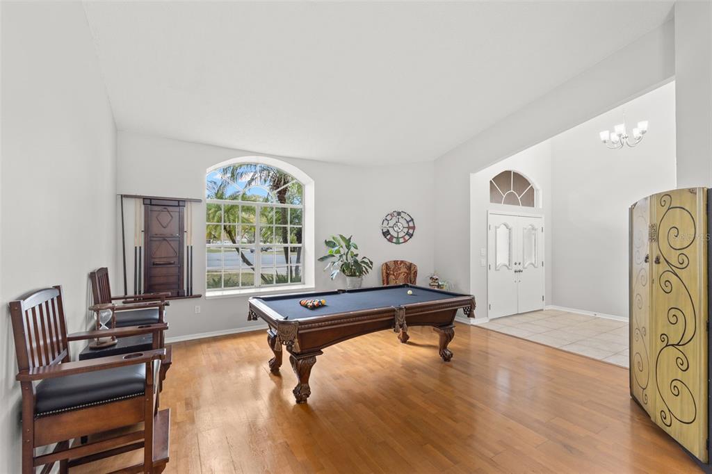 3734 Thornbush Lane New Port Richey, FL 34655 - Photo 19 of 47 a living room with furniture and a large window