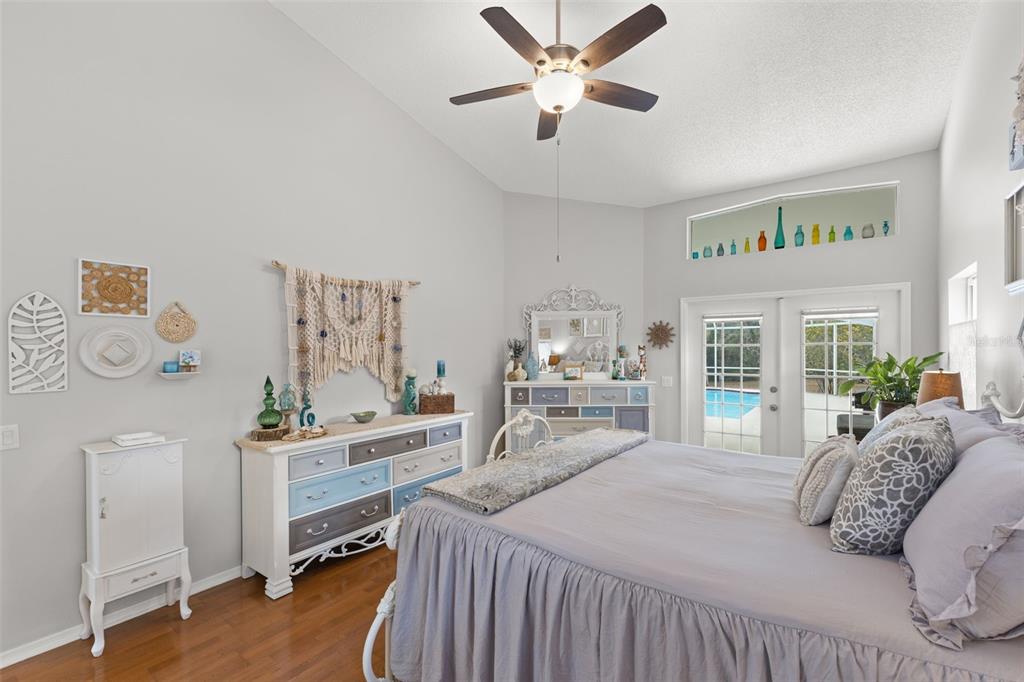 3734 Thornbush Lane New Port Richey, FL 34655 - Photo 21 of 47 a bedroom with a bed window and a table in it