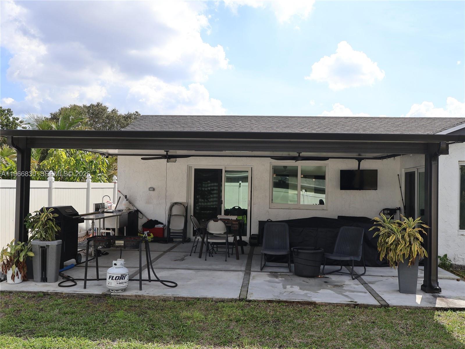 5505 Southwest 9th Street Margate, FL 33068 - Photo 14 of 53 a view of house with outdoor seating space