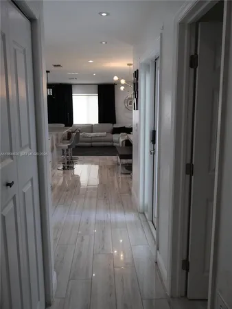 a bedroom with a bed and a chair