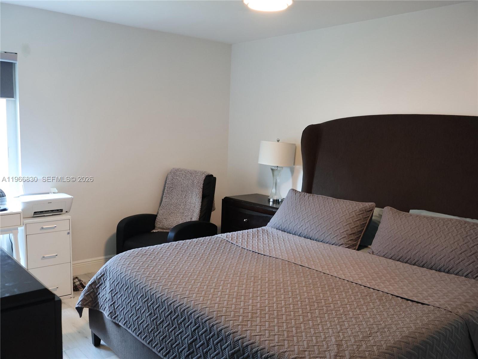 5505 Southwest 9th Street Margate, FL 33068 - Photo 5 of 53 a bedroom with bed and a closet