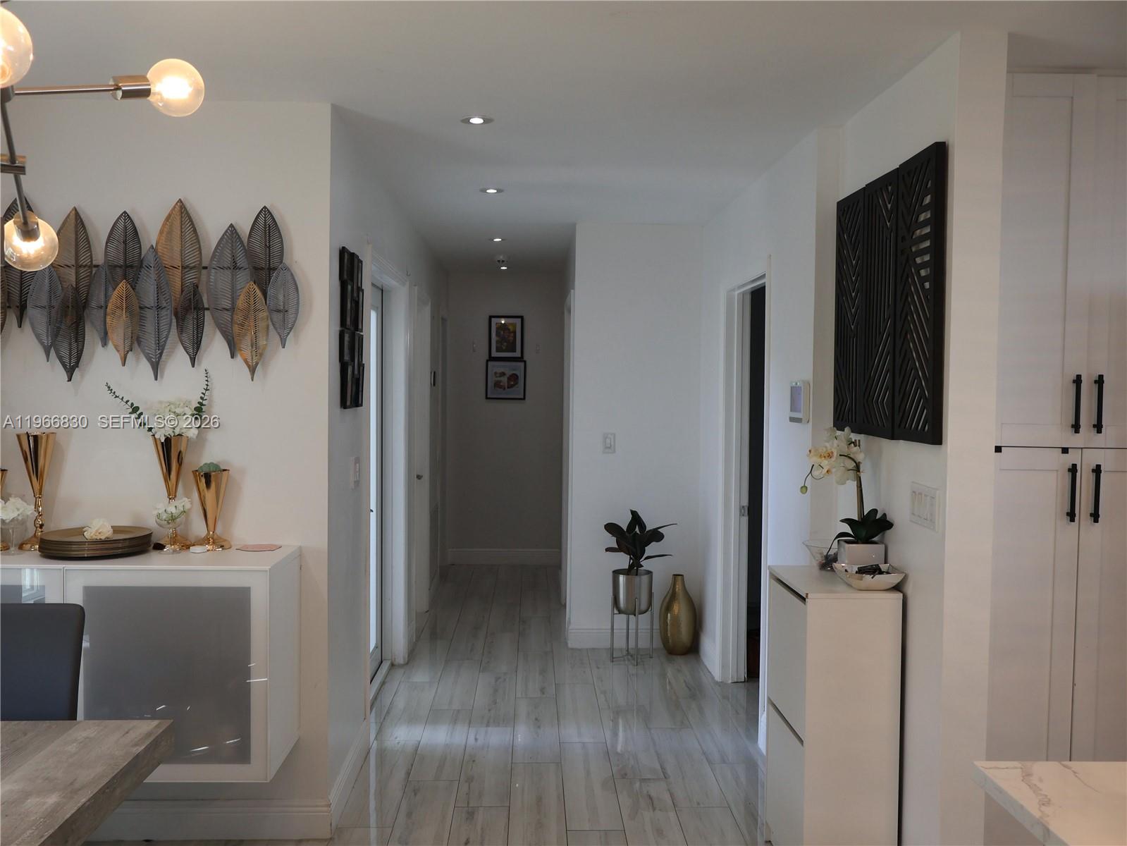 5505 Southwest 9th Street Margate, FL 33068 - Photo 10 of 53 a bathroom with a sink and mirror