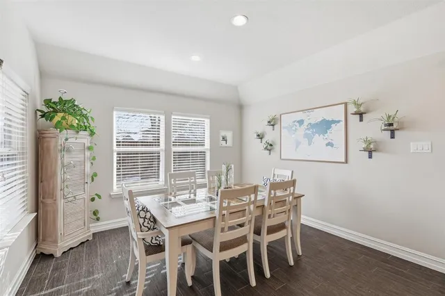 a view of a dining room with furniture