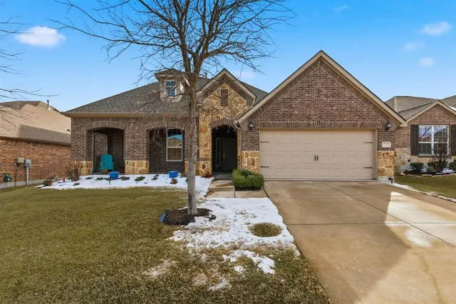 a view of a house with swimming pool and sitting area
