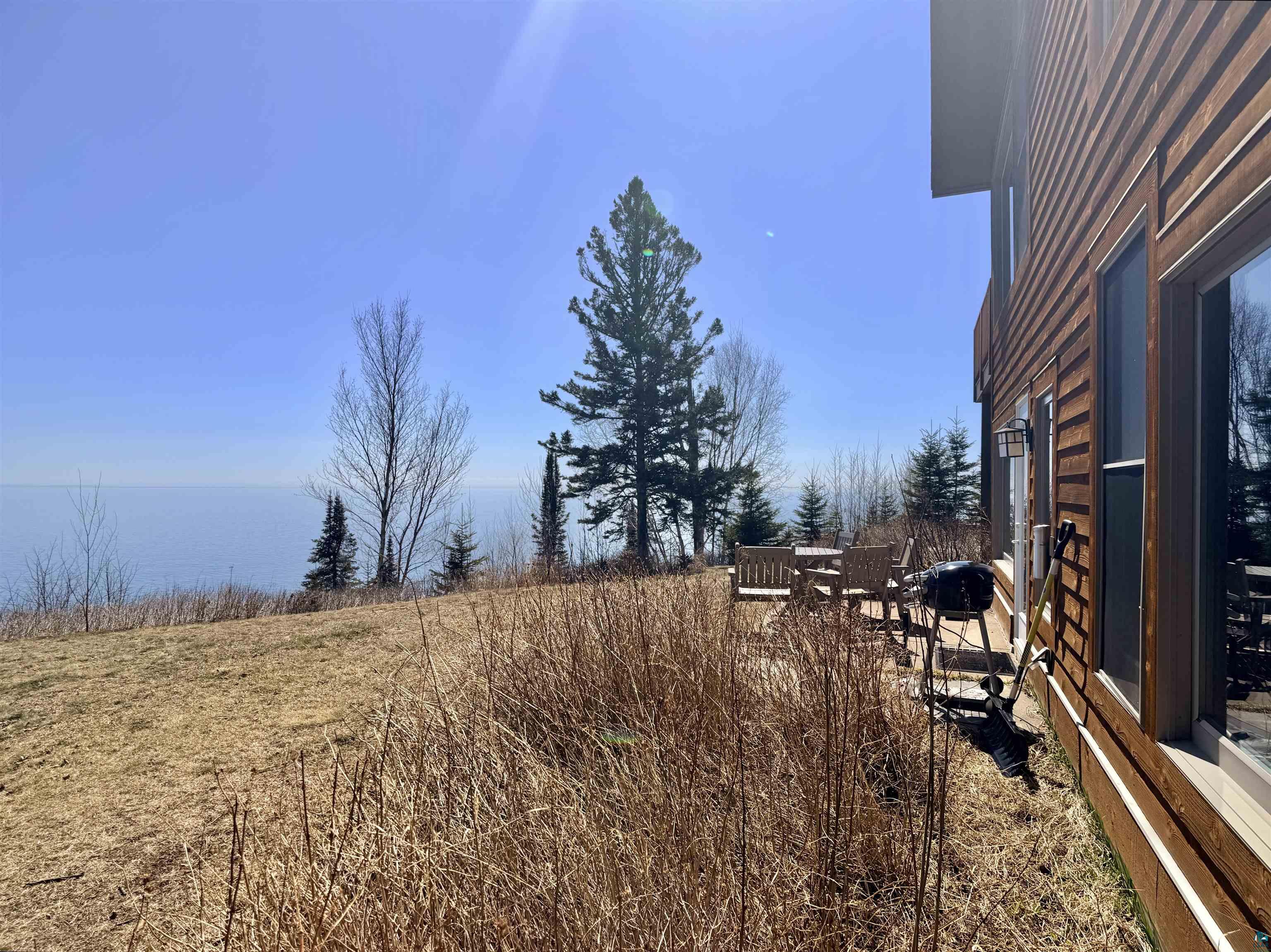 504-506 Poplar River Road, Unit 505 Lutsen, MN 55612 - Photo 39 of 39 Wood-sided exterior with expansive windows