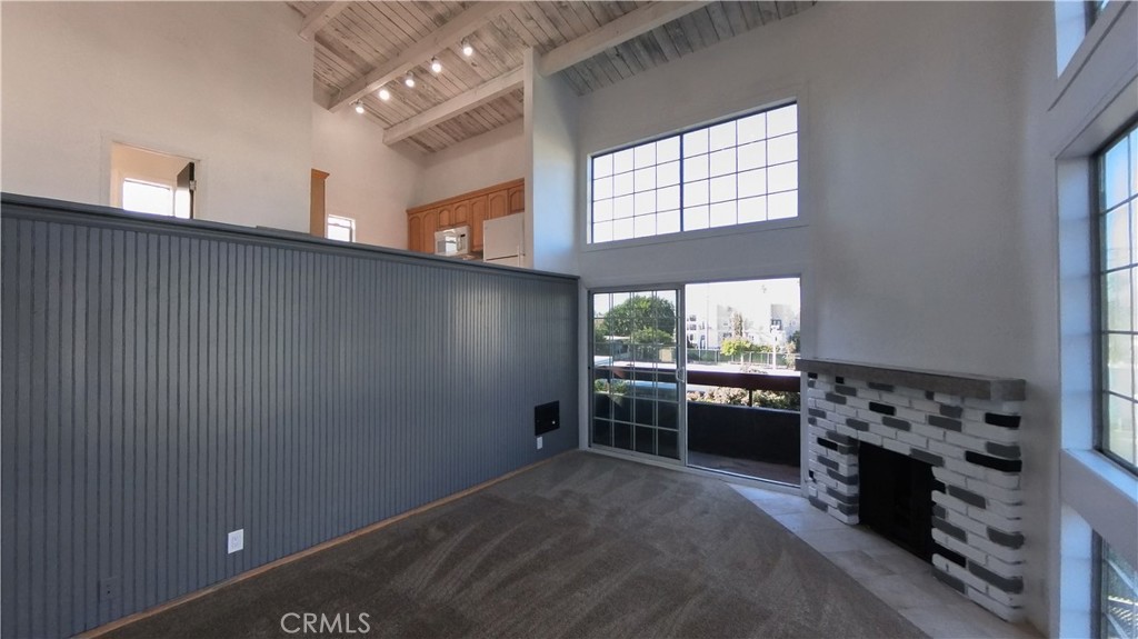 124 Buccaneer Street, Unit 1 Marina del Rey, CA 90292 - Photo 19 of 41 a kitchen with stainless steel appliances a stove and a refrigerator