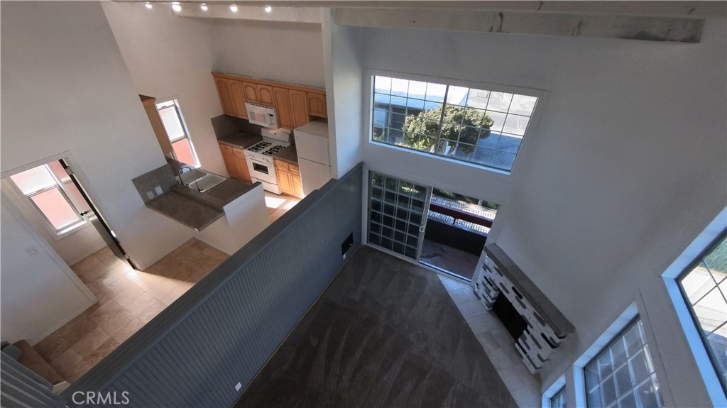 124 Buccaneer Street, Unit 1 Marina del Rey, CA 90292 - Photo 2 of 41 a view of living room with furniture and a window