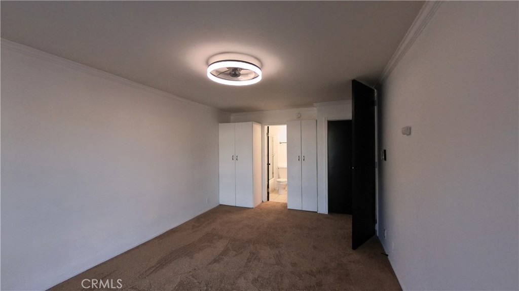 124 Buccaneer Street, Unit 1 Marina del Rey, CA 90292 - Photo 24 of 41 an empty room with windows and entrance