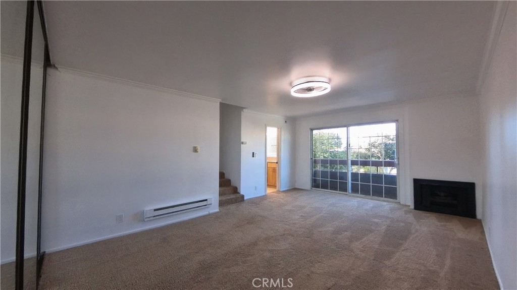 124 Buccaneer Street, Unit 1 Marina del Rey, CA 90292 - Photo 28 of 41 a view of empty room with window and ceiling fan