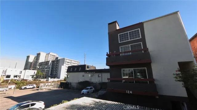 a view of balcony with furniture