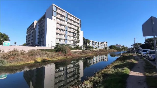 a view of building with outdoor space and river