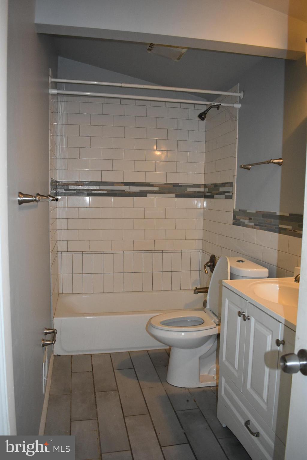 8411 Billson Road Randallstown, MD 21133 - Photo 7 of 11 Upstairs bathroom