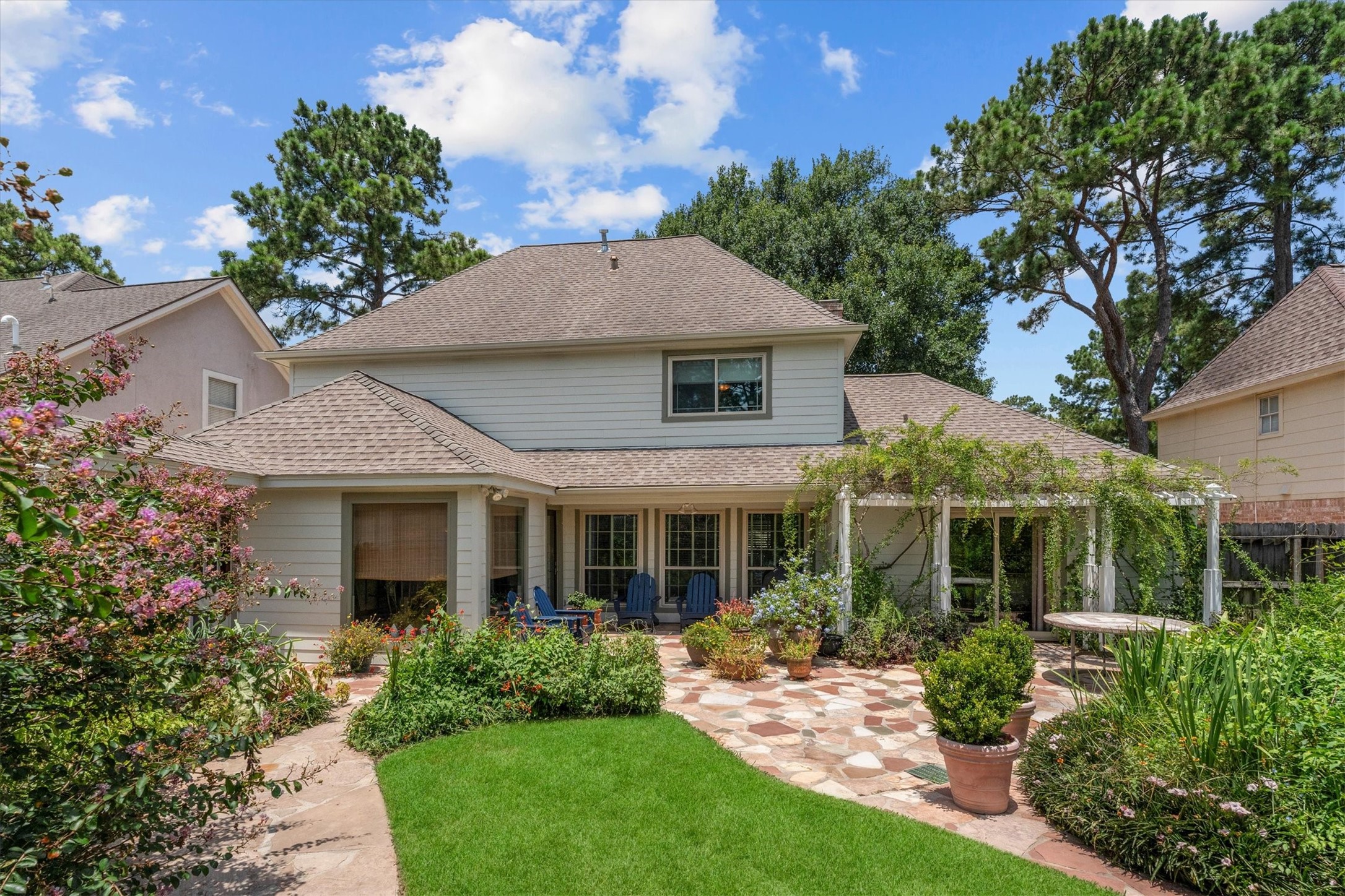 9103 Herts Road Spring, TX 77379 - Photo 37 of 46 Sellers added a large, multi-stone patio in the backyard that makes entertaining so easy.