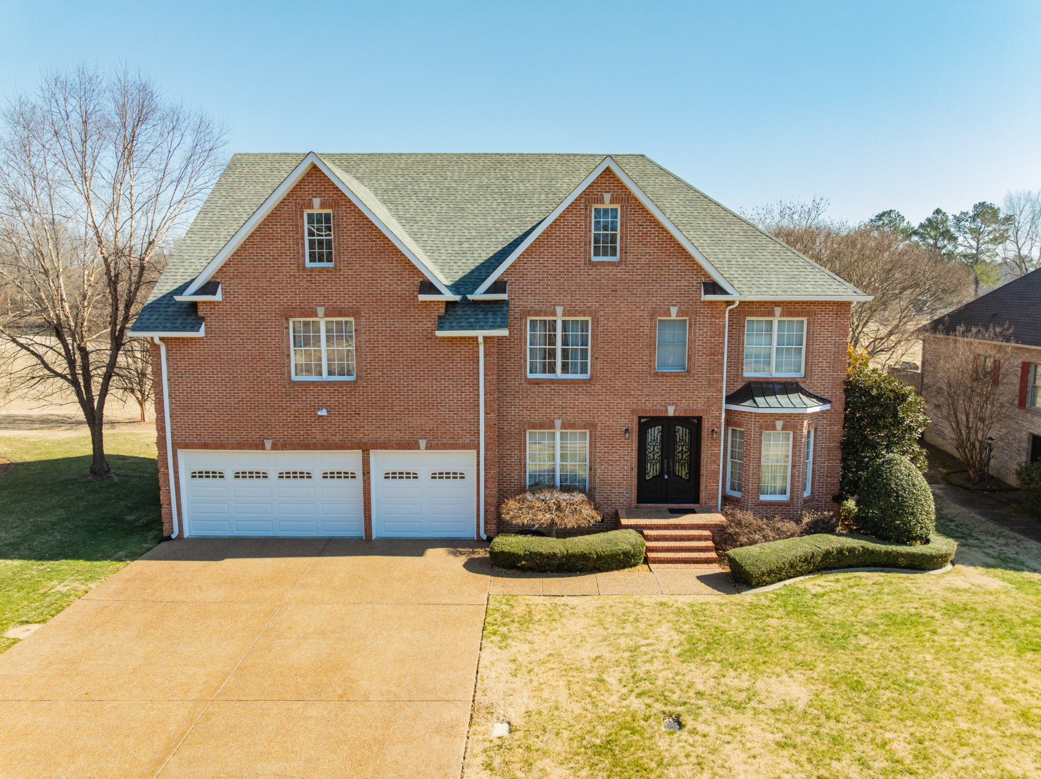 114 Courtside Lane Tullahoma, TN 37388 - Photo 1 of 85 a front view of a house with a yard
