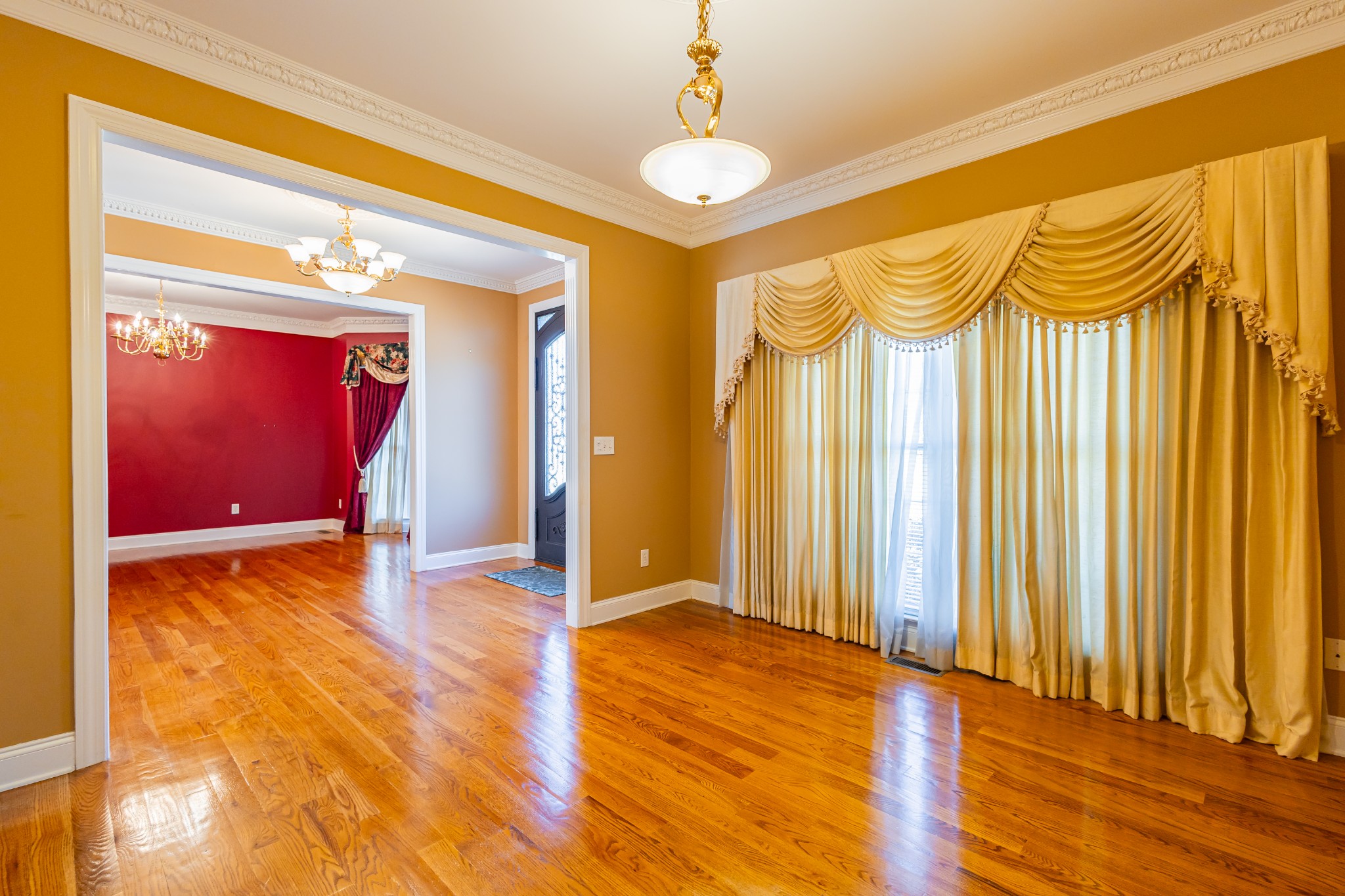 114 Courtside Lane Tullahoma, TN 37388 - Photo 11 of 85 a view of an empty room with wooden floor and a window