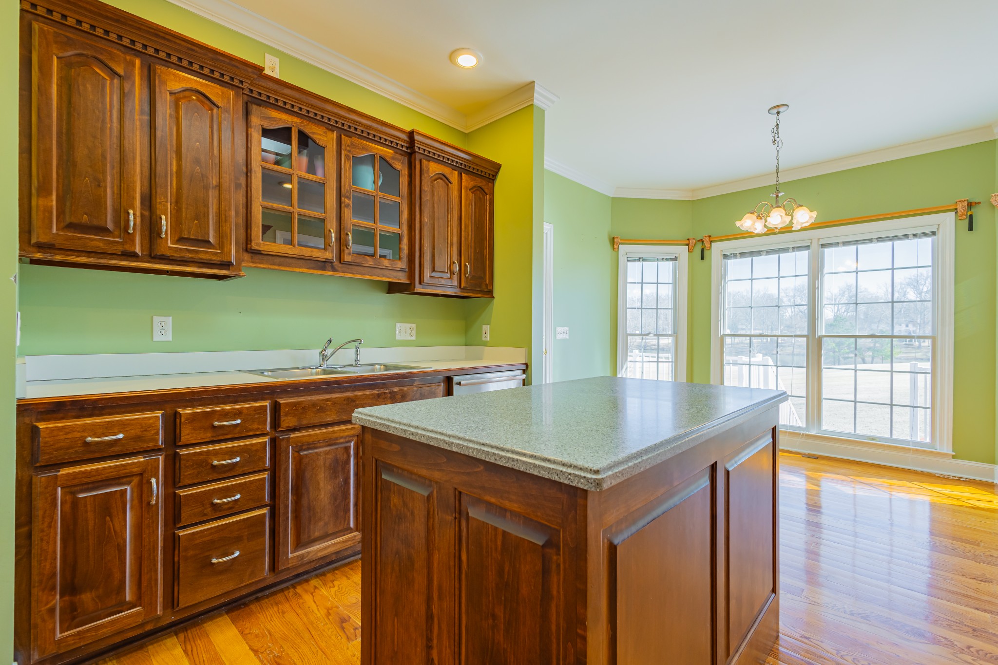 114 Courtside Lane Tullahoma, TN 37388 - Photo 20 of 85 a kitchen with stainless steel appliances granite countertop a sink dishwasher and a stove with wooden floor