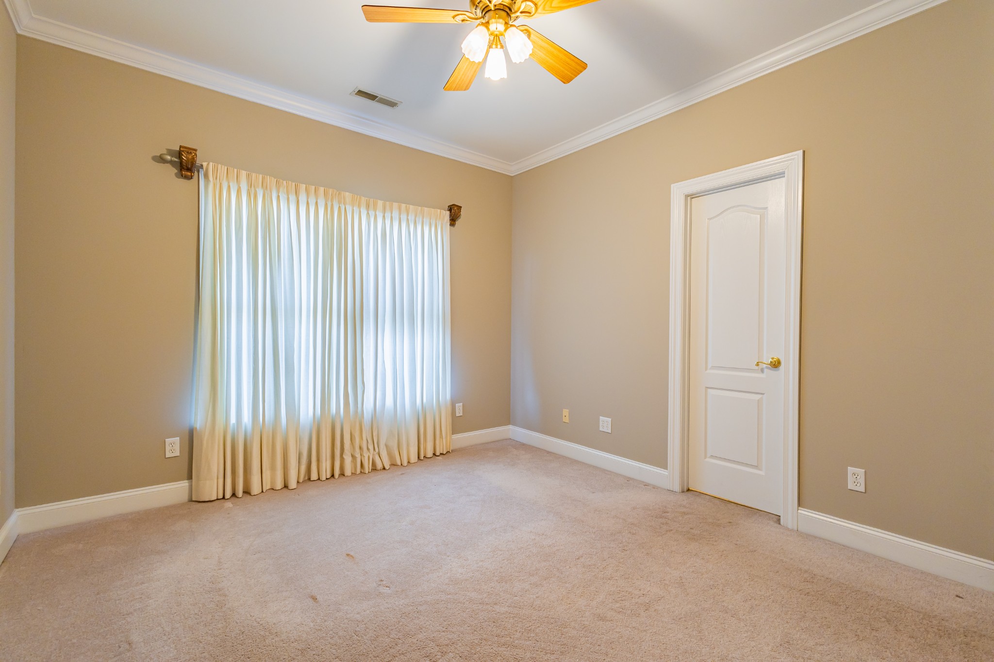 114 Courtside Lane Tullahoma, TN 37388 - Photo 35 of 85 an empty room with a window and chandelier fan