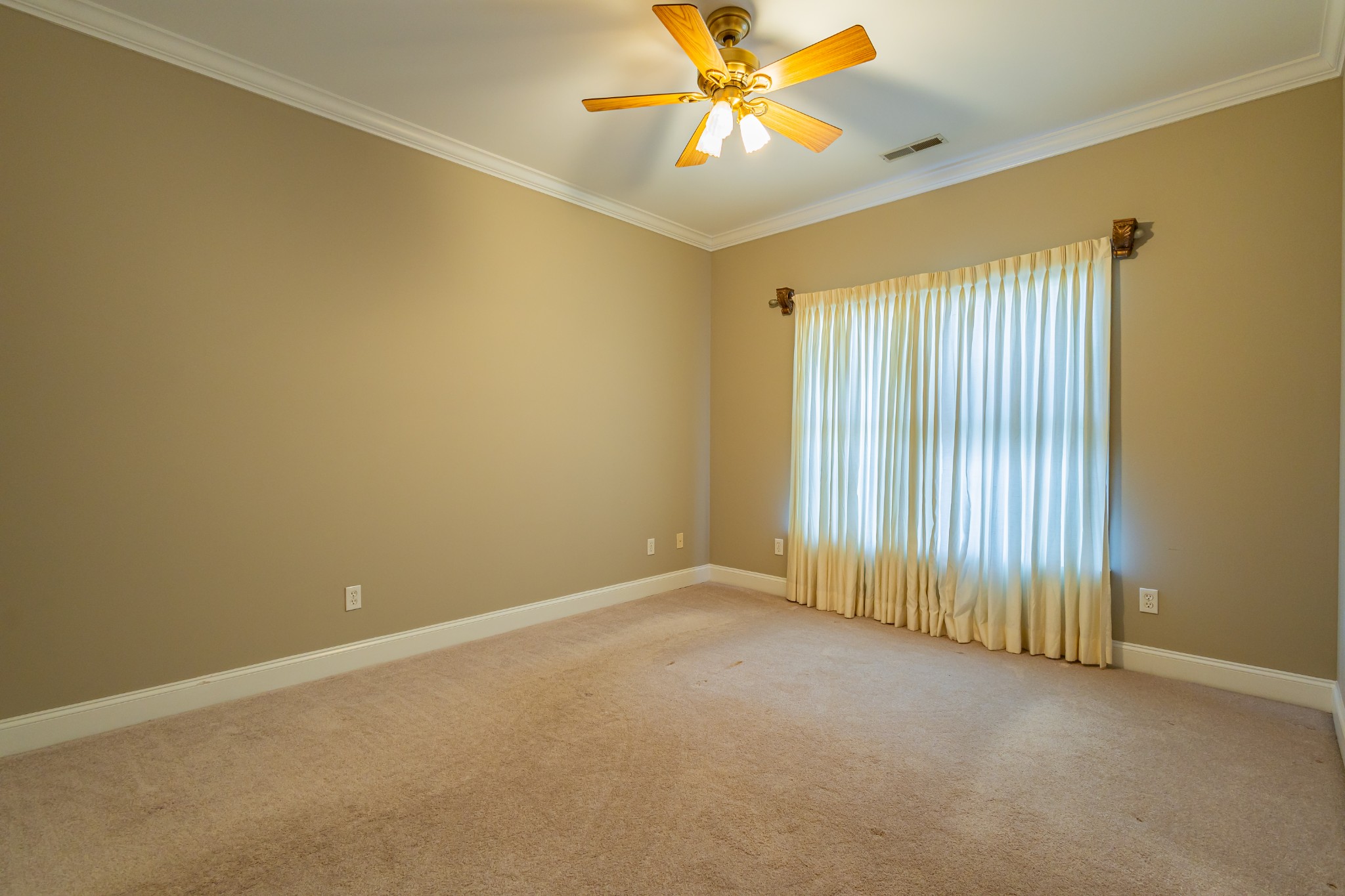 114 Courtside Lane Tullahoma, TN 37388 - Photo 38 of 85 an empty room with a window and a fan