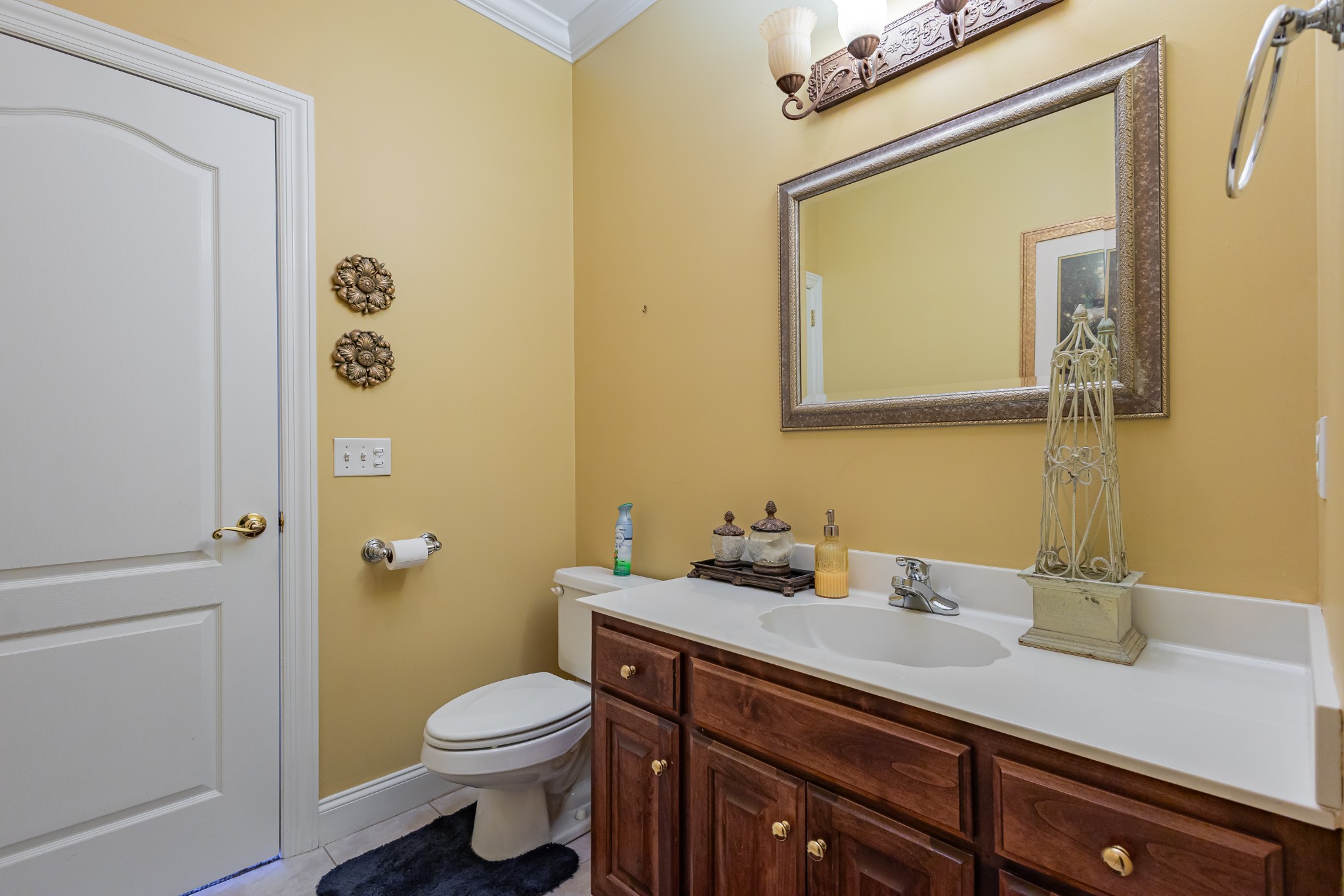 114 Courtside Lane Tullahoma, TN 37388 - Photo 60 of 85 a bathroom with a sink a toilet and mirror