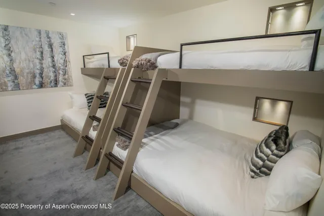 a bed room with furniture and a window