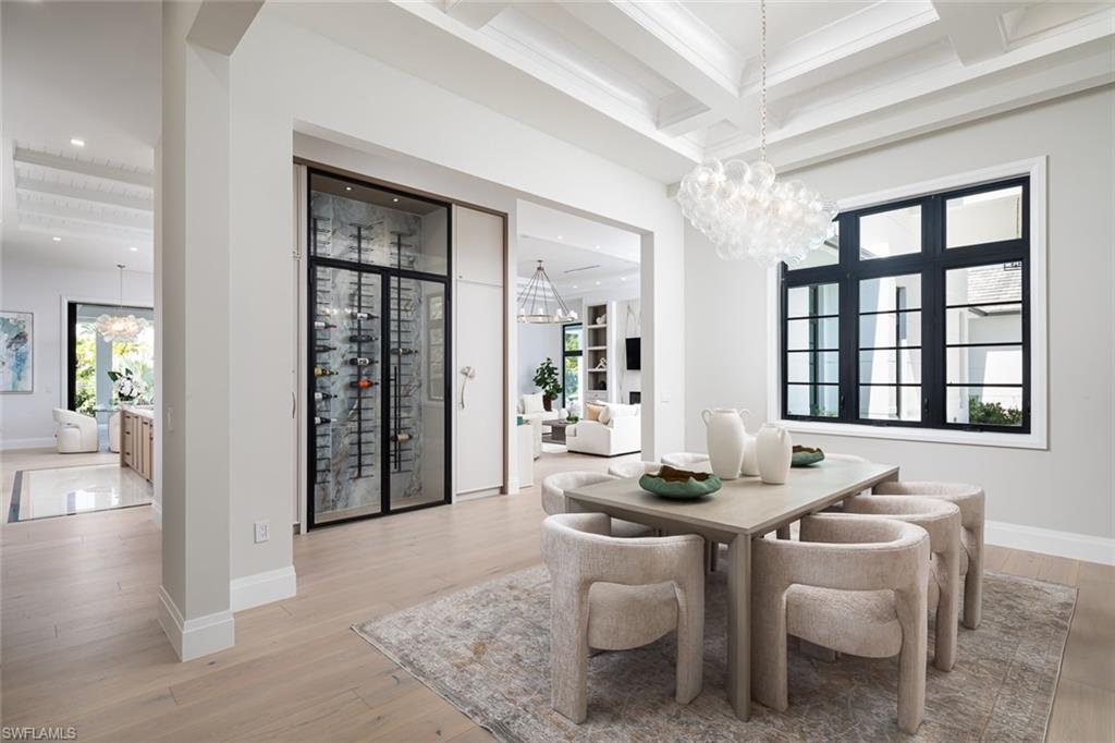 445 West Street Naples, FL 34108 - Photo 18 of 40 a dining room with furniture and window