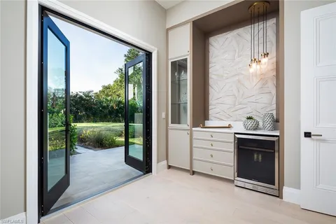 a bathroom with a sink a mirror and a shower