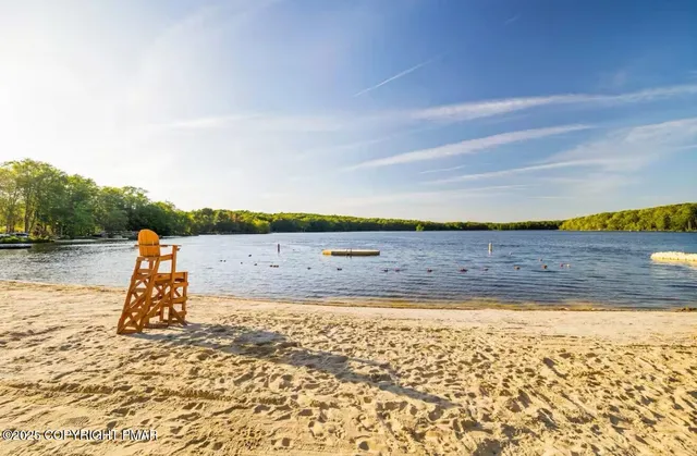 a view of a lake with a yard