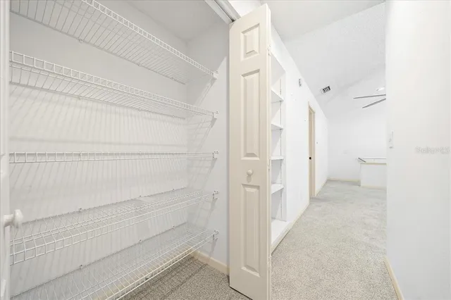 an aerial view of house with a swimming pool