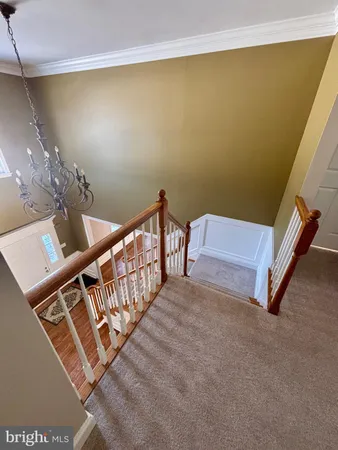 a view of an empty room with windows