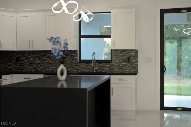 $370,000 | 1004 Grant Boulevard, Lehigh Acres, FL 33974